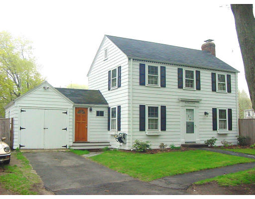 1 Mohawk Road Marblehead, MA 01945 - Photo 1 of 1 a front view of a house with a garden