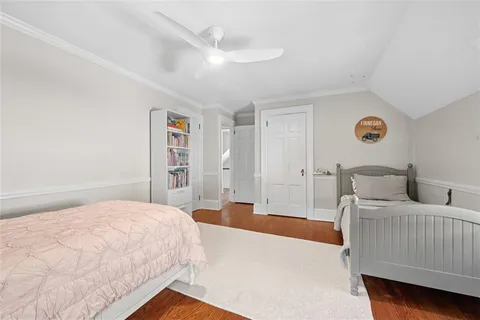 a bedroom with a bed and a cabinets