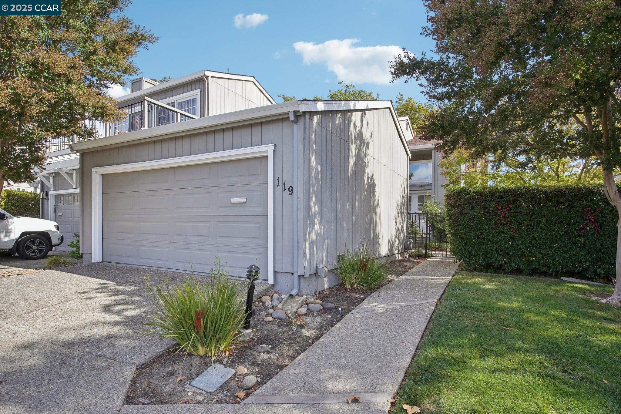 119 Cypress Point Way Moraga, CA 94556 - Photo 1 of 38 a view of a house with a yard and plant
