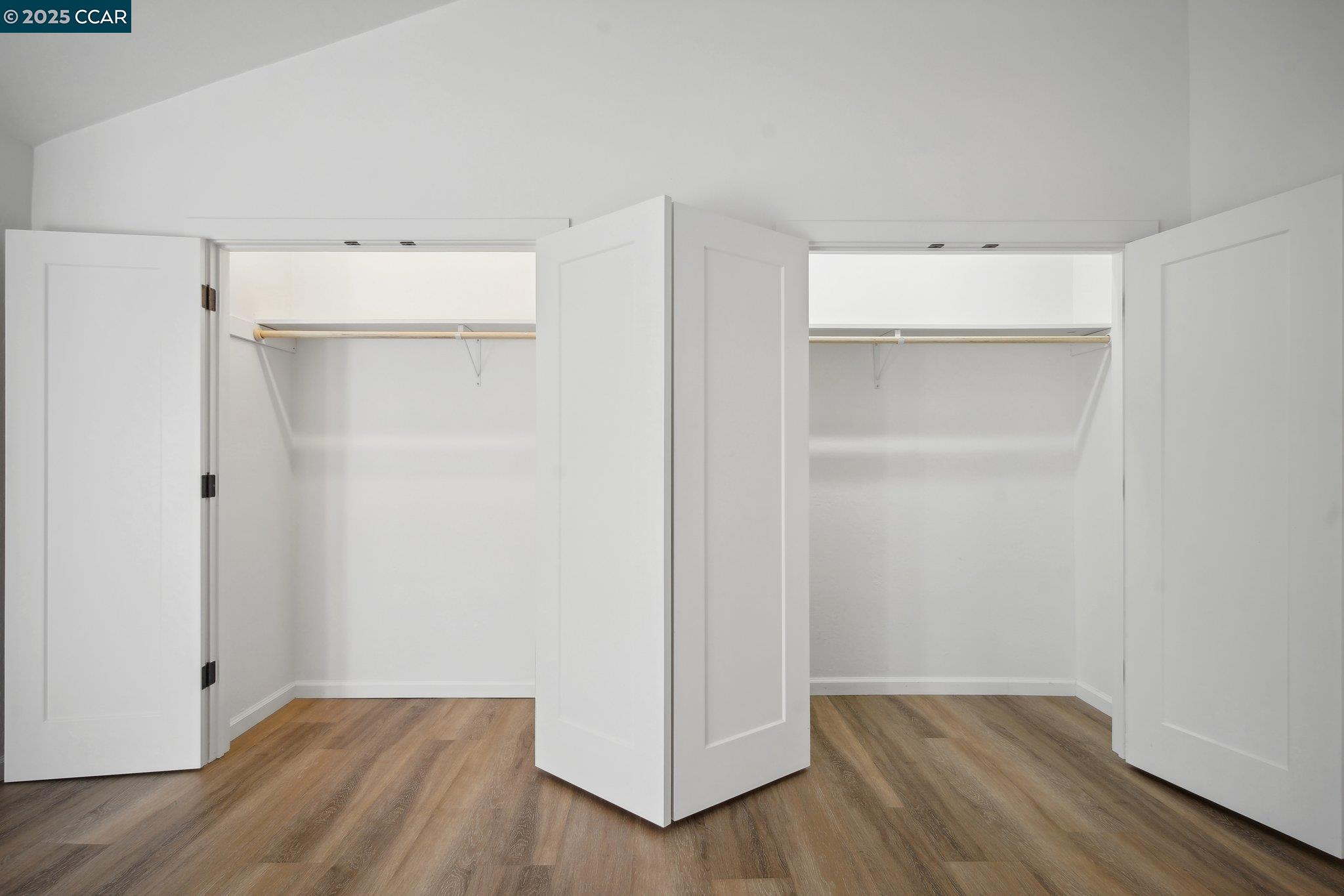 119 Cypress Point Way Moraga, CA 94556 - Photo 17 of 38 a view of an empty room with wooden floor