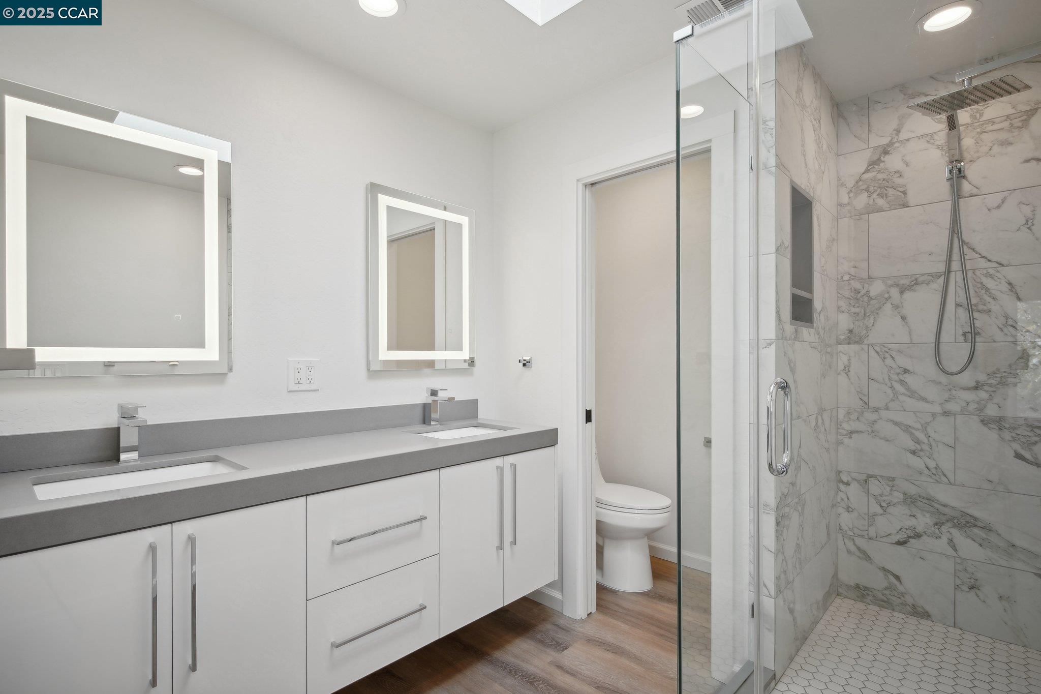 119 Cypress Point Way Moraga, CA 94556 - Photo 19 of 38 a bathroom with a double vanity sink mirror and toilet