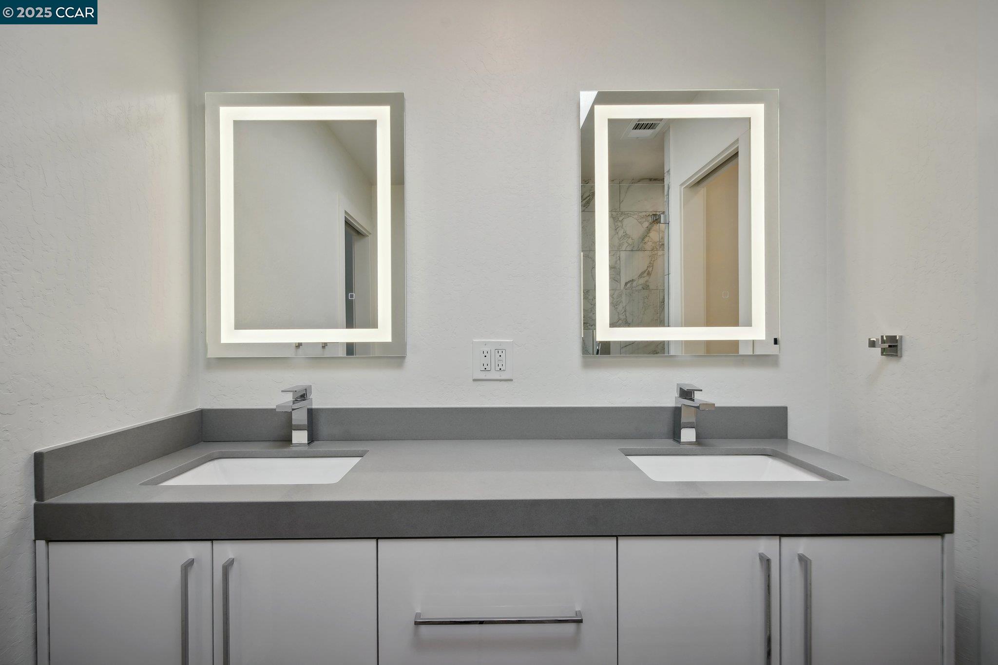 119 Cypress Point Way Moraga, CA 94556 - Photo 20 of 38 a bathroom with double sink and two mirror
