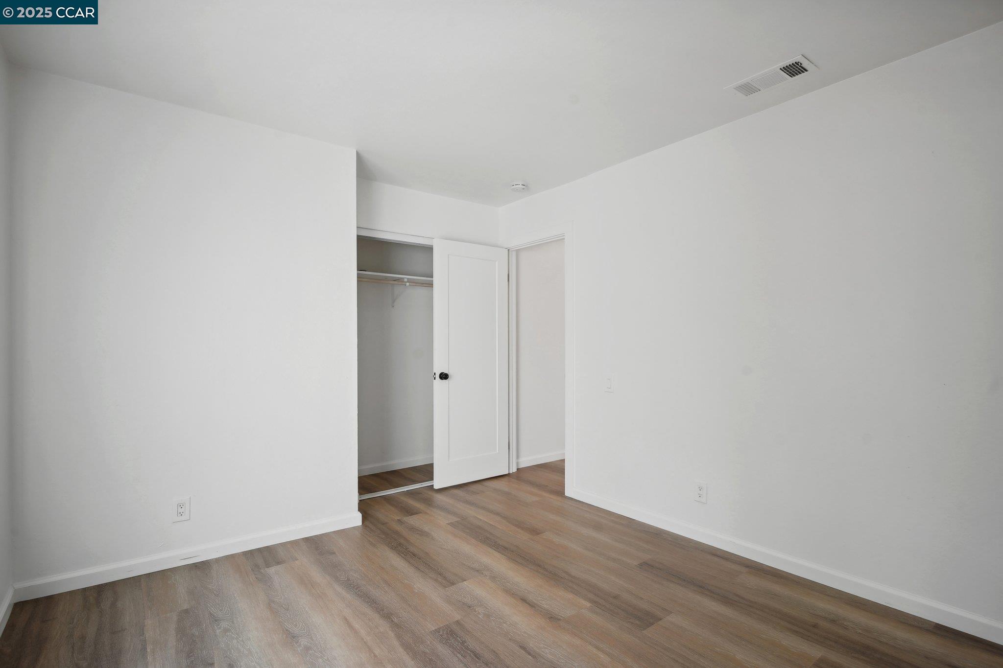 119 Cypress Point Way Moraga, CA 94556 - Photo 23 of 38 a view of an empty room with wooden floor