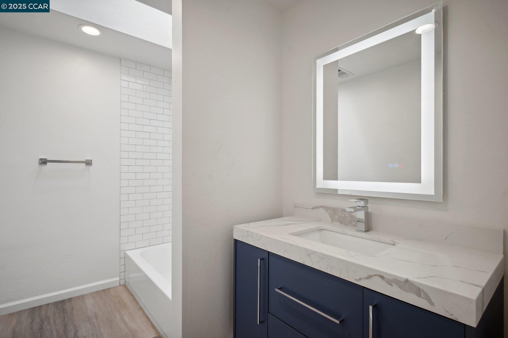 119 Cypress Point Way Moraga, CA 94556 - Photo 26 of 38 a bathroom with a sink a vanity and a mirror