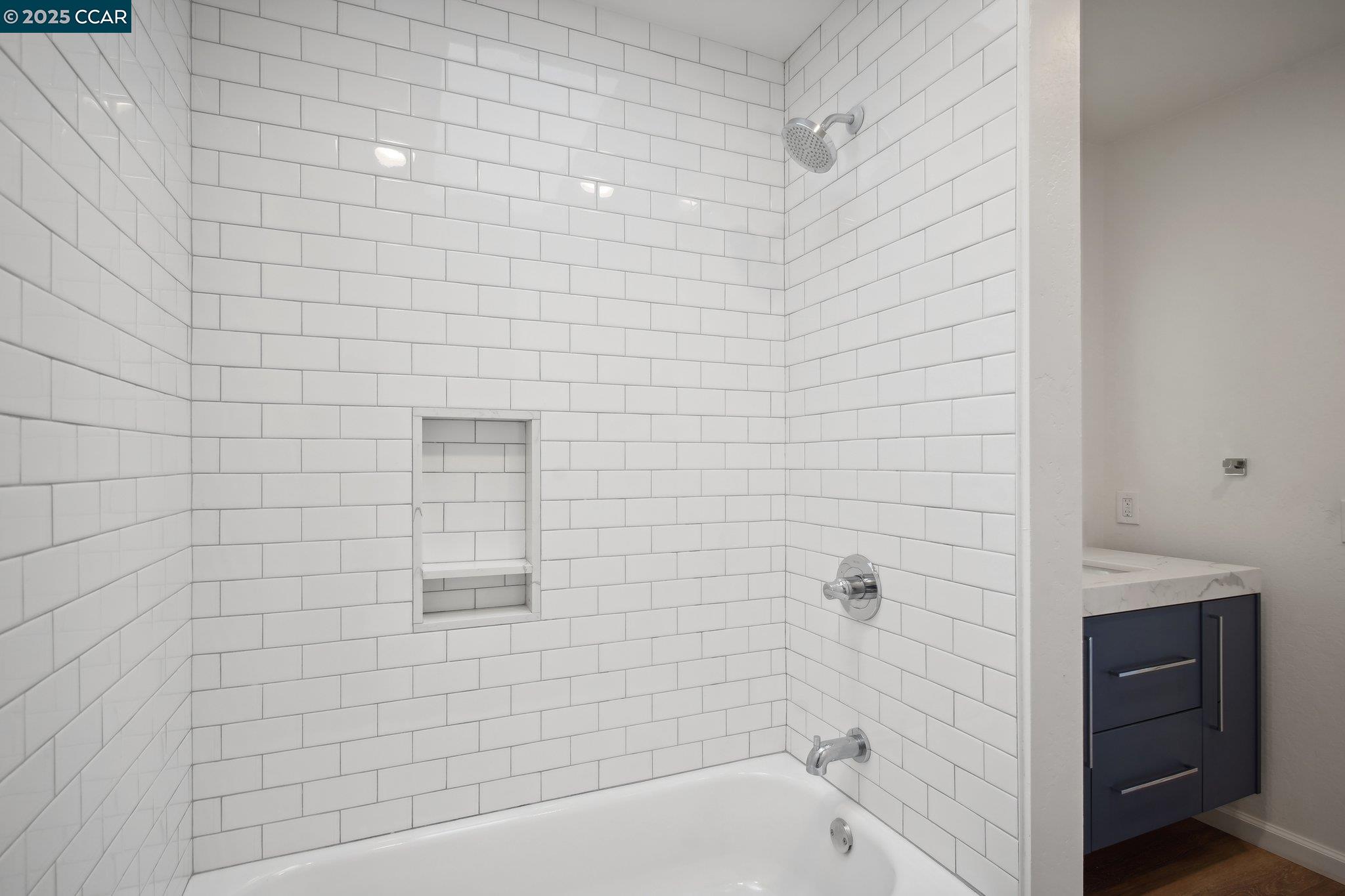 119 Cypress Point Way Moraga, CA 94556 - Photo 27 of 38 a bathroom with a bathtub and shower