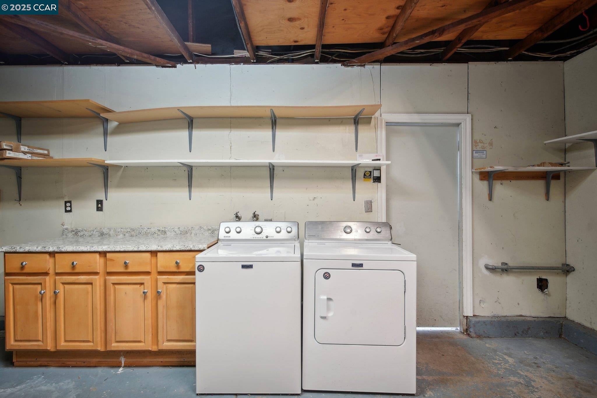 119 Cypress Point Way Moraga, CA 94556 - Photo 29 of 38 a utility room with cabinets washer and dryer