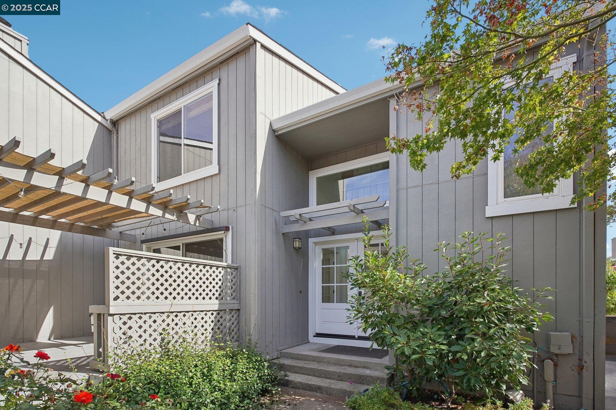 119 Cypress Point Way Moraga, CA 94556 - Photo 30 of 38 a front view of a house with a garden