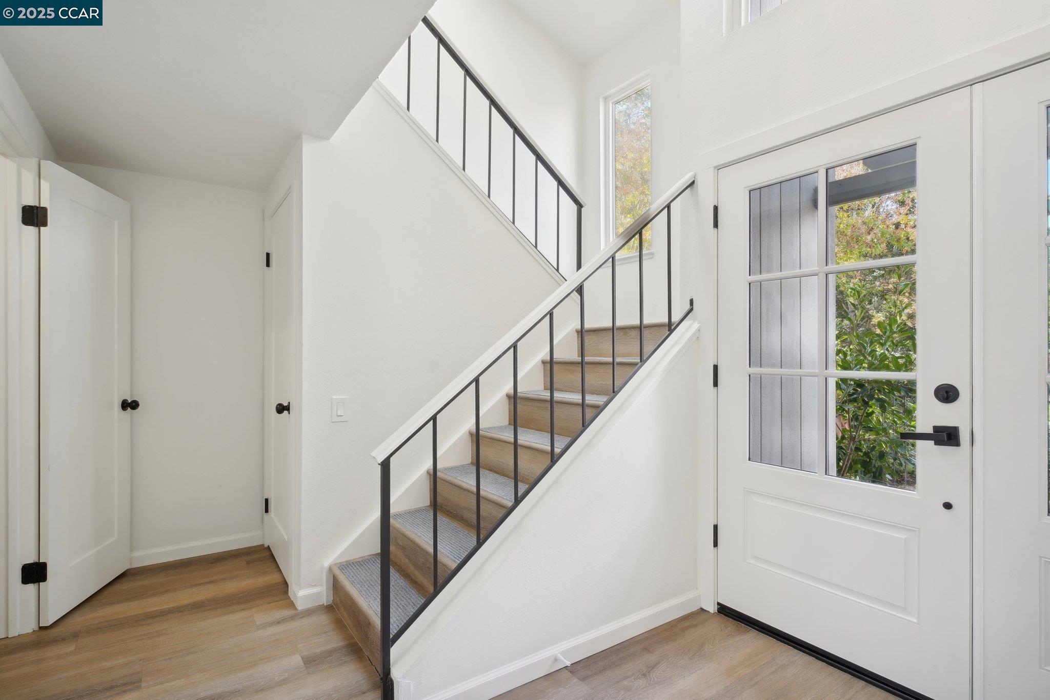 119 Cypress Point Way Moraga, CA 94556 - Photo 3 of 38 a view of entryway with wooden floor and stairs