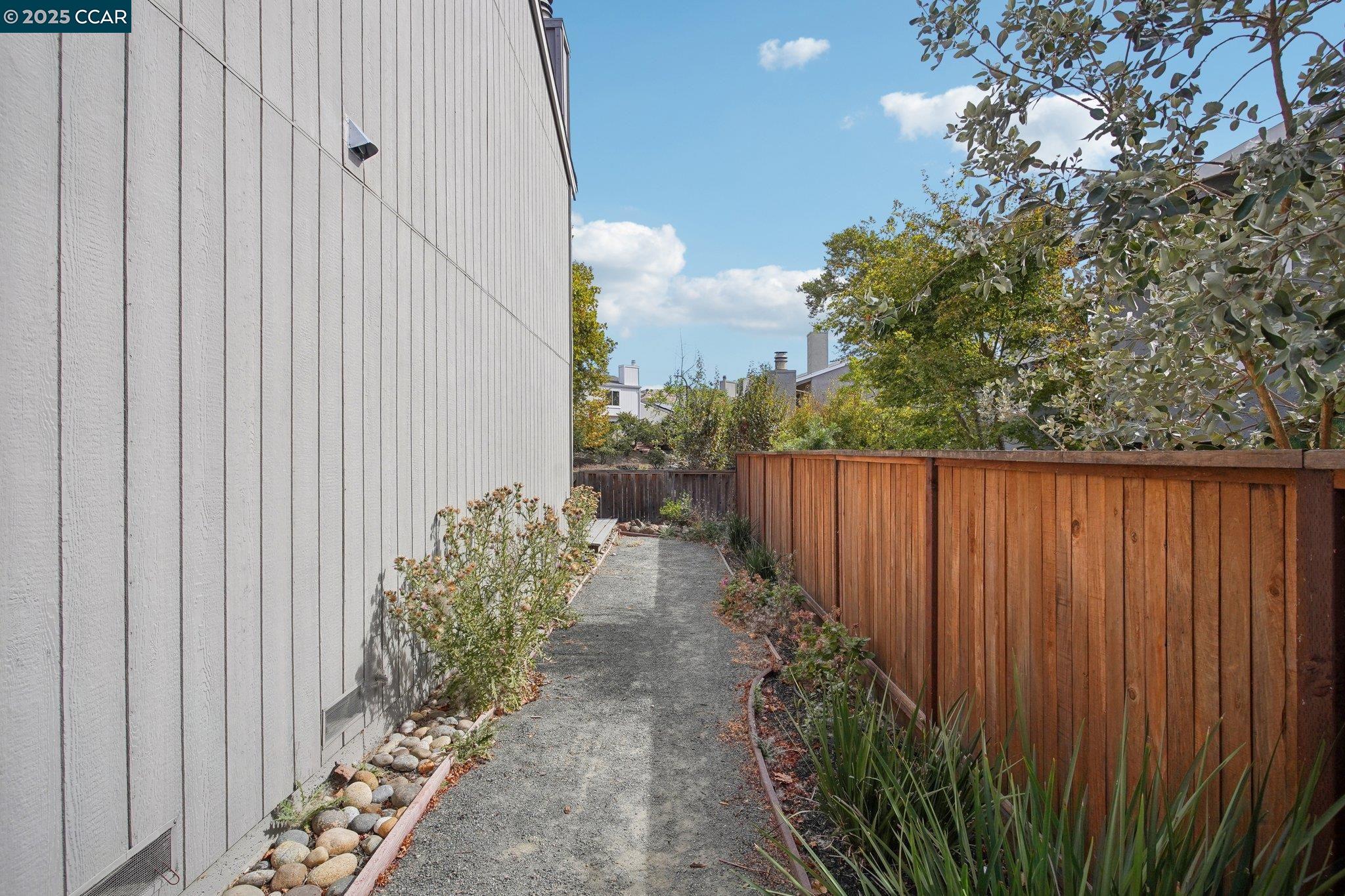 119 Cypress Point Way Moraga, CA 94556 - Photo 36 of 38 a view of a pathway with a wooden fence