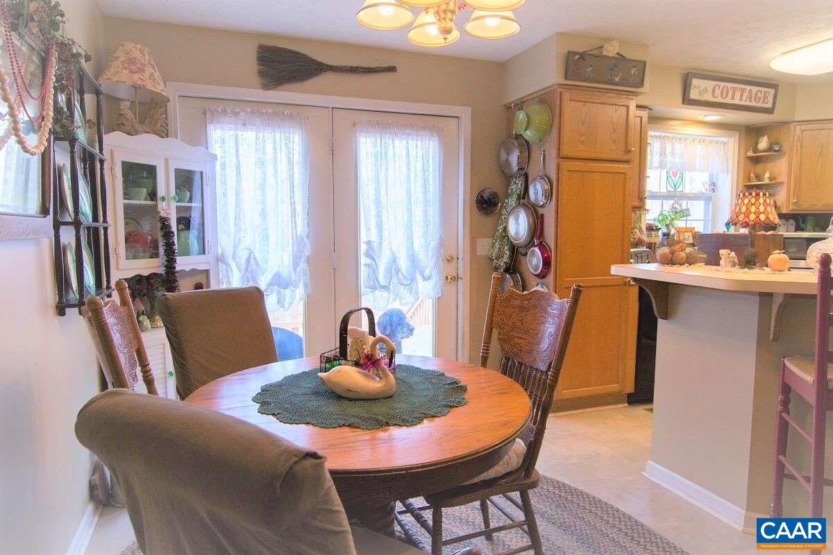33 Riverside Drive Palmyra, VA 22963 - Photo 5 of 10 a view of a dining room with furniture window and wooden floor