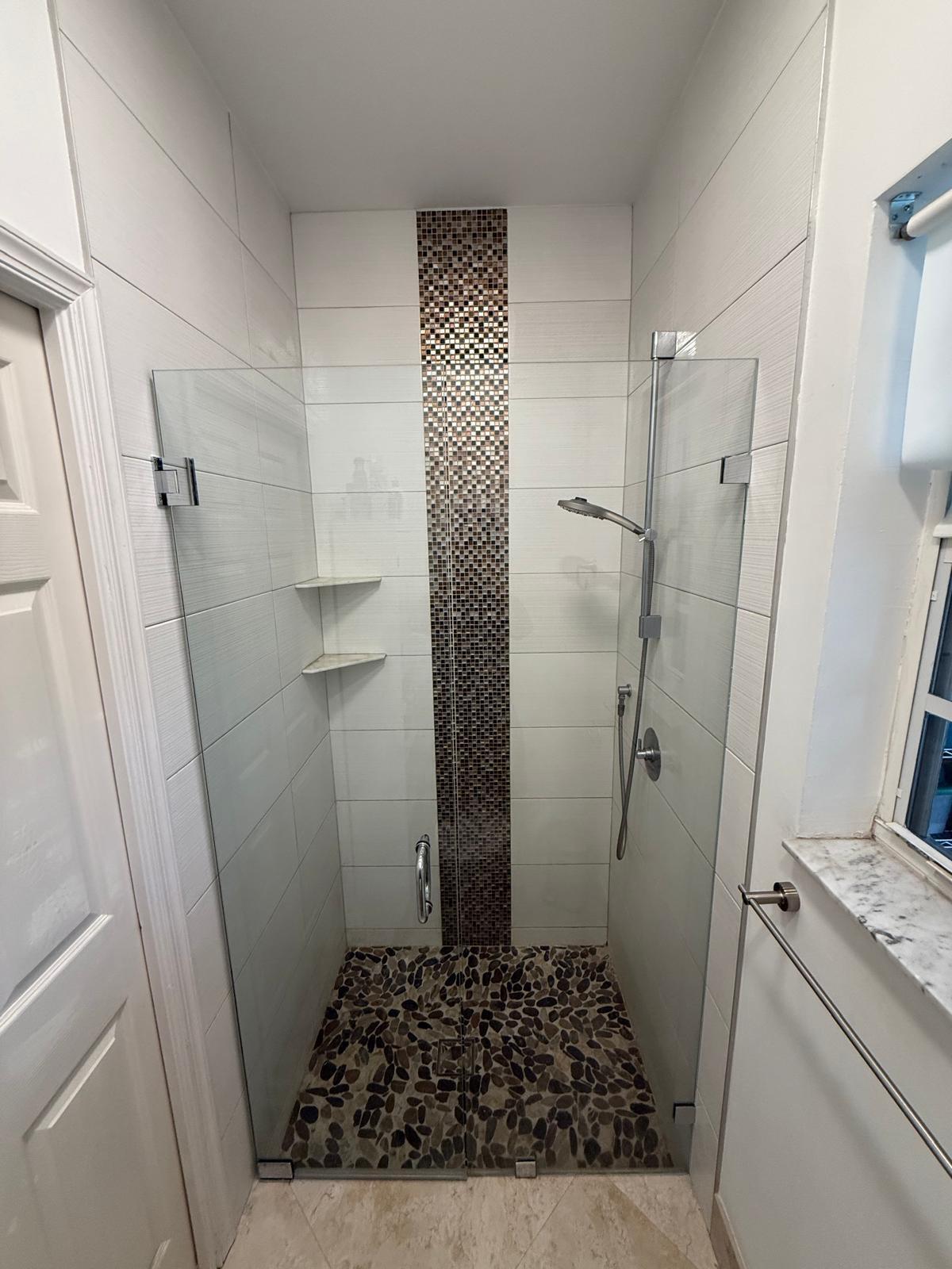 5180 Sabal Gardens Lane, Unit 4 Boca Raton, FL 33487 - Photo 12 of 15 a bathroom with a granite countertop shower and a sink