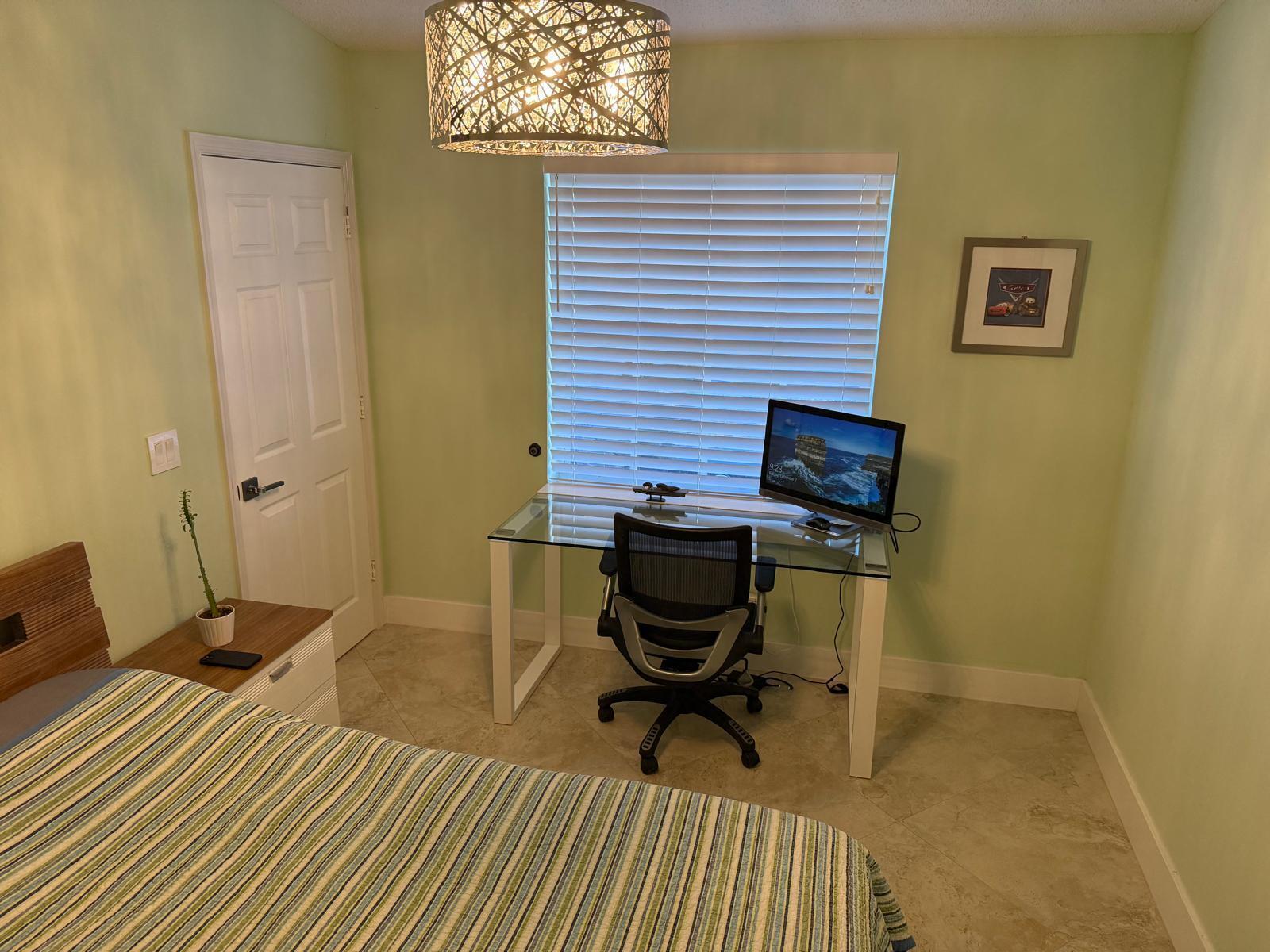 5180 Sabal Gardens Lane, Unit 4 Boca Raton, FL 33487 - Photo 15 of 15 a workspace area with table and chair