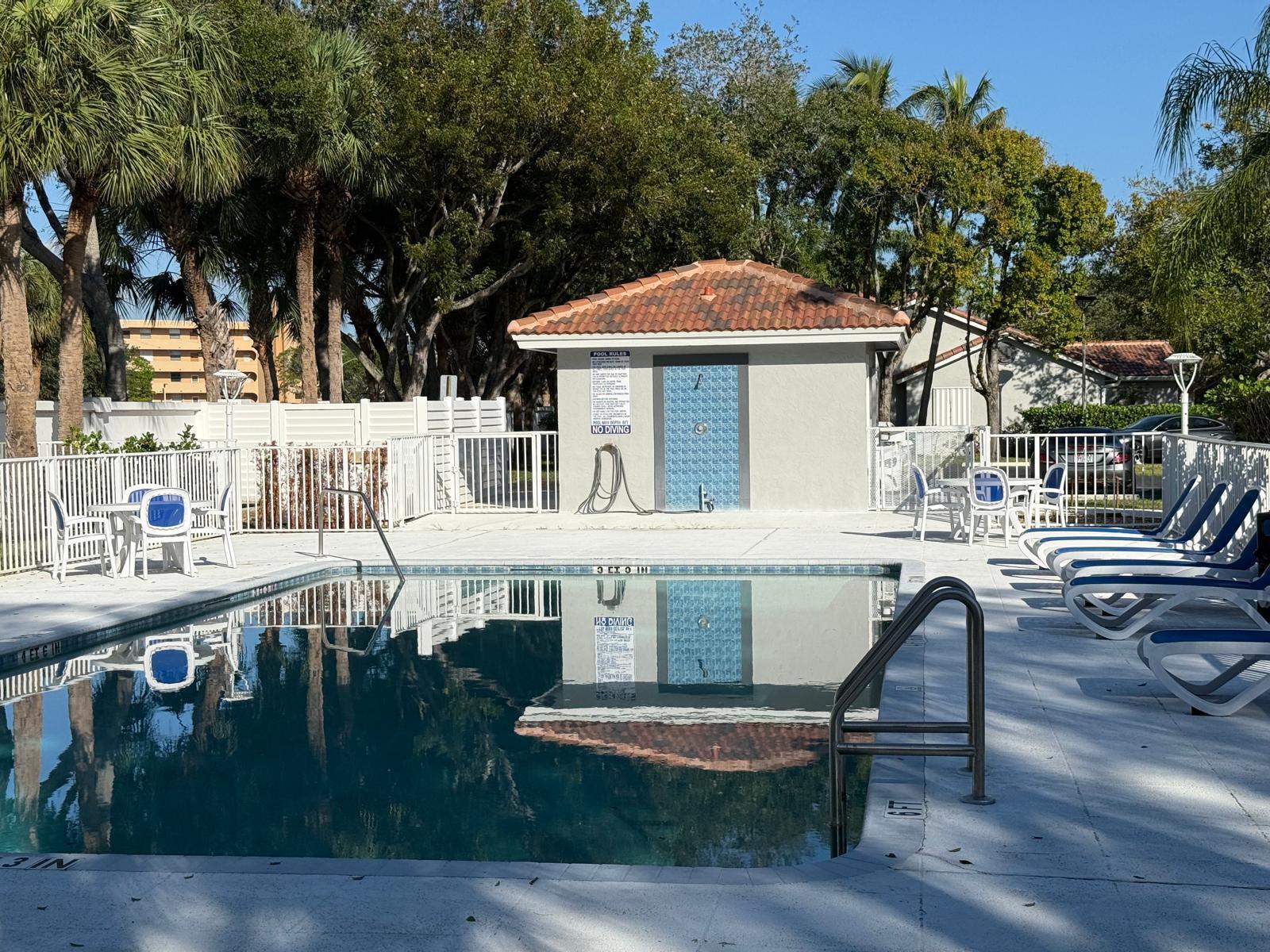 5180 Sabal Gardens Lane, Unit 4 Boca Raton, FL 33487 - Photo 6 of 15 a view of house with swimming pool outdoor seating