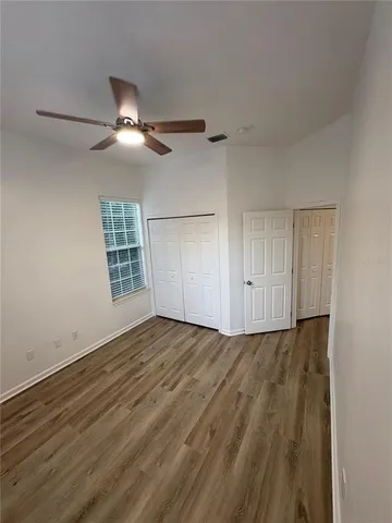 a kitchen with a sink stainless steel appliances and cabinets