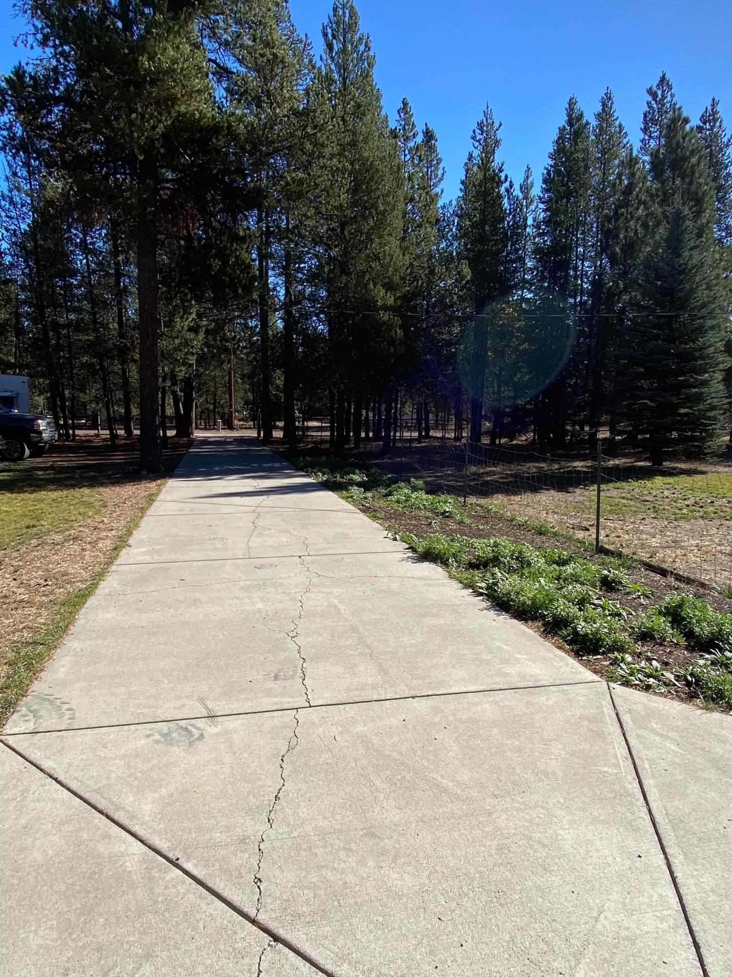 53421 Deep Woods Road La Pine, OR 97739 - Photo 27 of 33 Concrete driveway