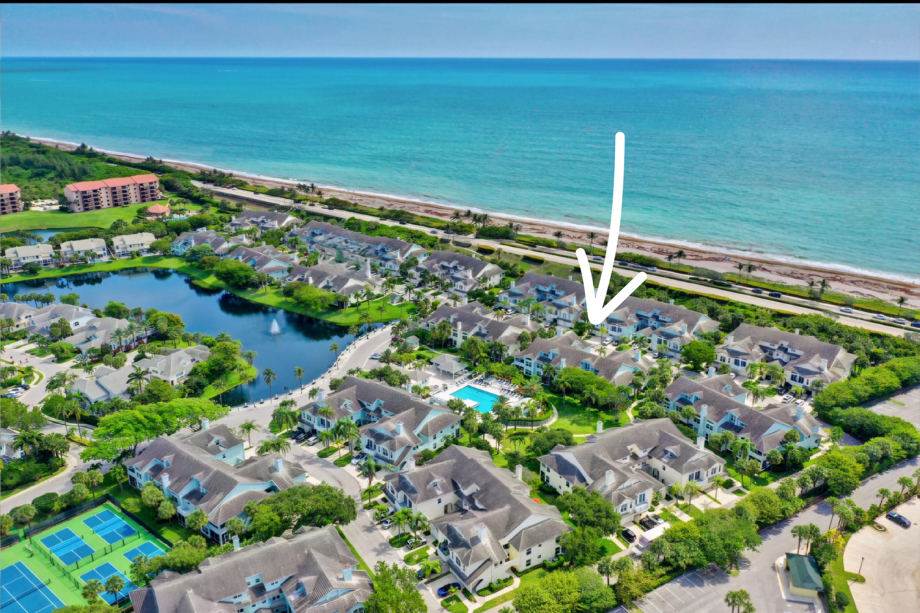 1206 Mainsail Circle Jupiter, FL 33477 - Photo 1 of 46 a view of a garden with an outdoor space