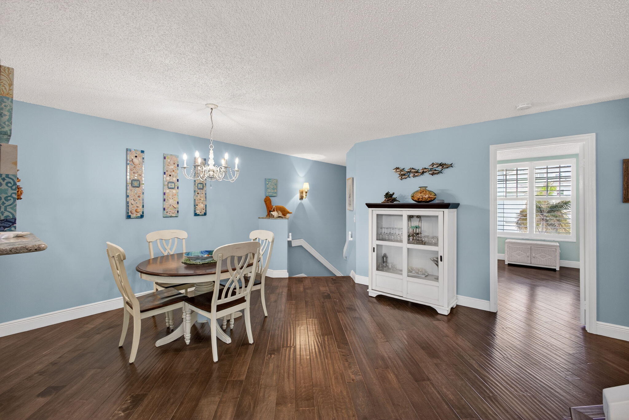 1206 Mainsail Circle Jupiter, FL 33477 - Photo 14 of 46 a view of a dining room with furniture and wooden floor