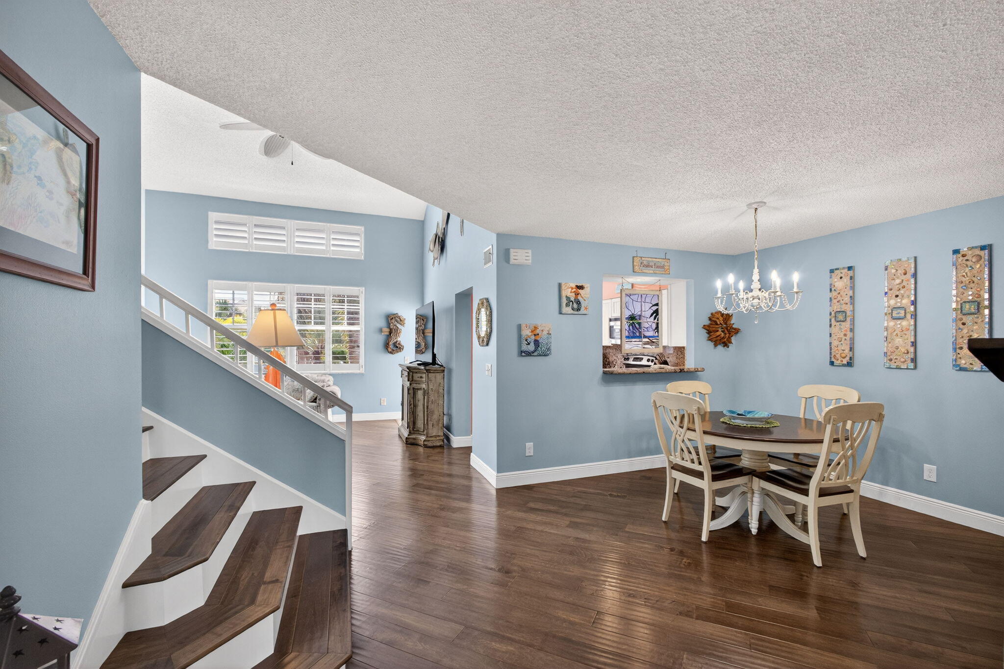 1206 Mainsail Circle Jupiter, FL 33477 - Photo 16 of 46 a view of a dining room with furniture and wooden floor