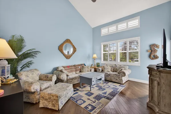 a living room with furniture and a window