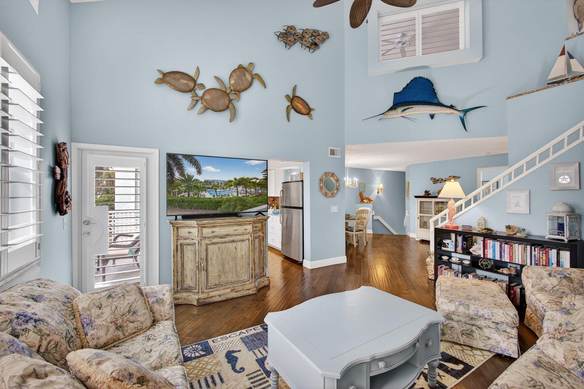 1206 Mainsail Circle Jupiter, FL 33477 - Photo 20 of 46 a living room with furniture and a flat screen tv