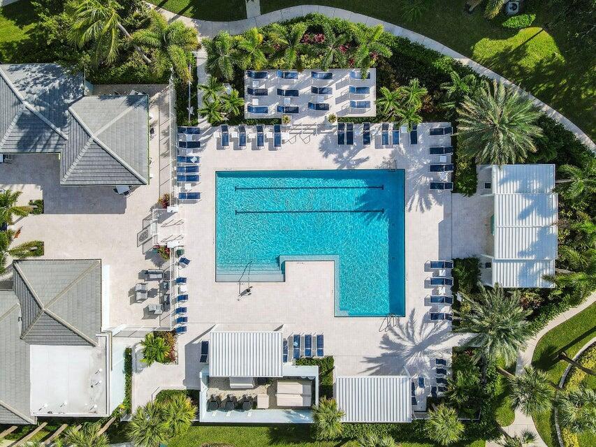 1206 Mainsail Circle Jupiter, FL 33477 - Photo 2 of 46 an aerial view of a house with a yard and large tree