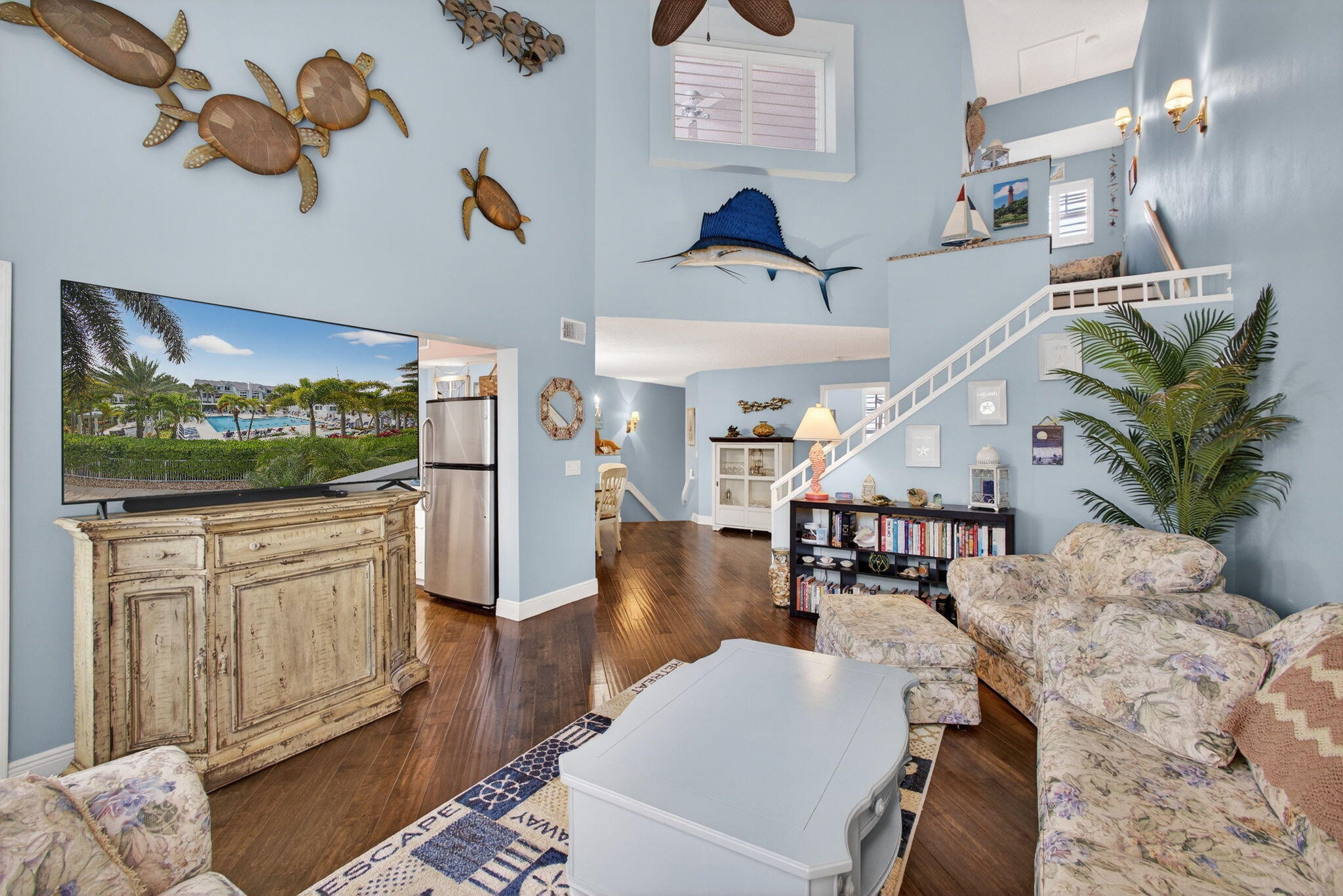 1206 Mainsail Circle Jupiter, FL 33477 - Photo 21 of 46 a living room with furniture and a flat screen tv