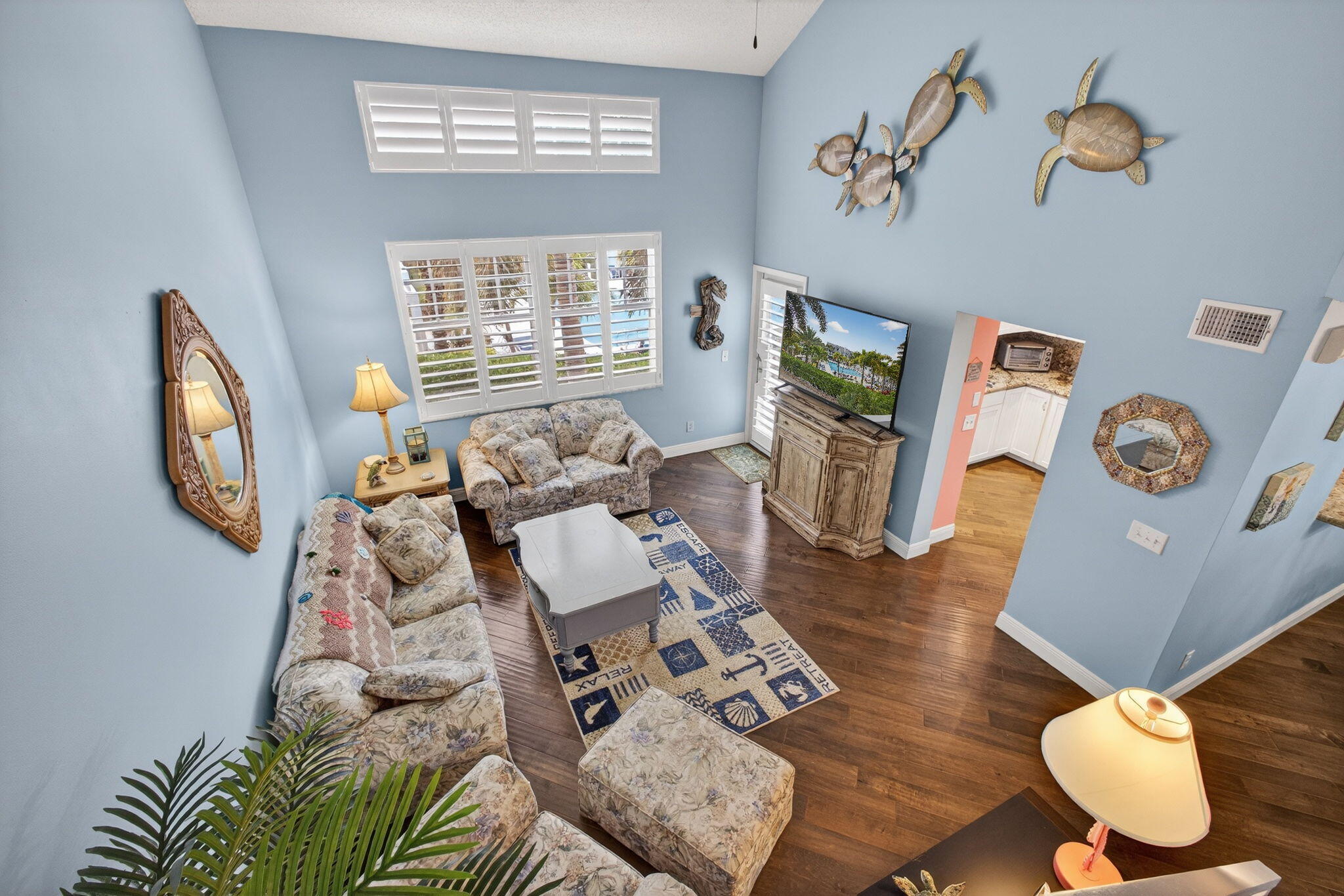 1206 Mainsail Circle Jupiter, FL 33477 - Photo 22 of 46 a living room with furniture and a window