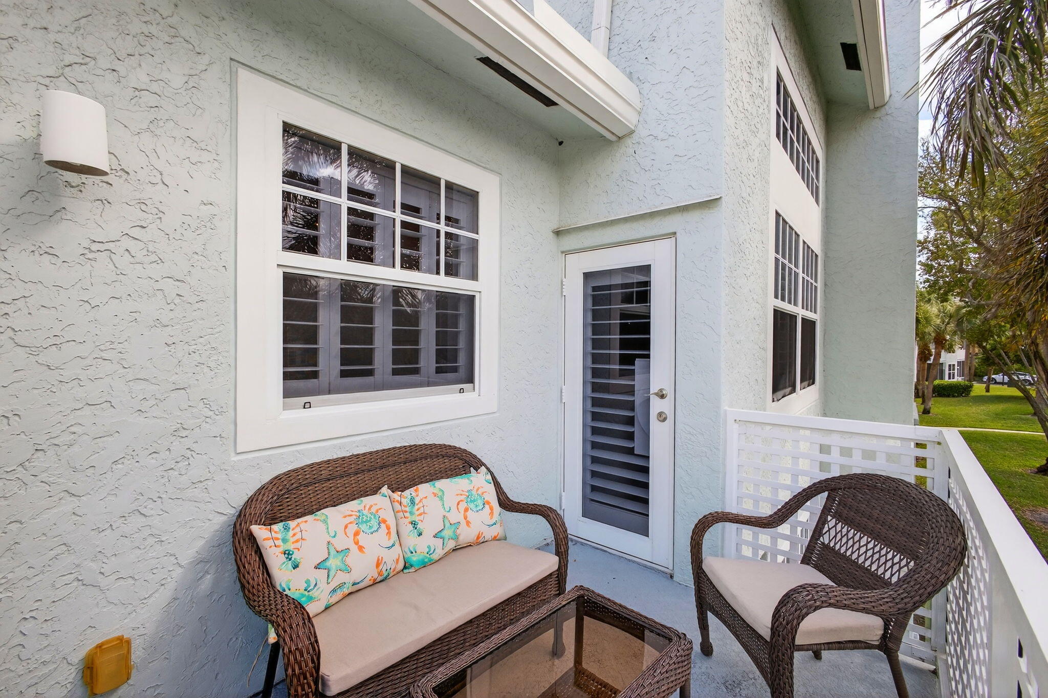 1206 Mainsail Circle Jupiter, FL 33477 - Photo 29 of 46 a outdoor living space with patio furniture and a fireplace