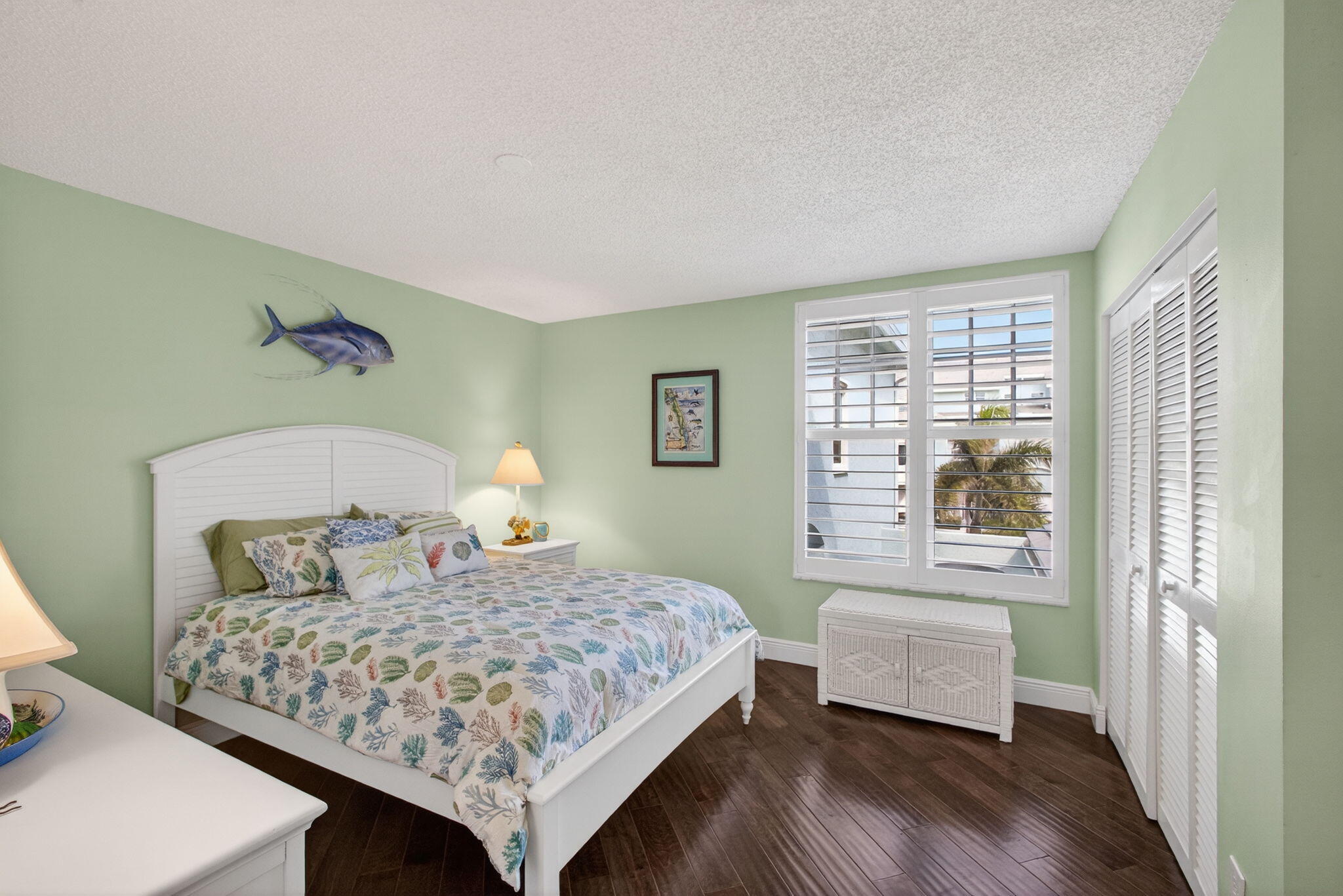 1206 Mainsail Circle Jupiter, FL 33477 - Photo 32 of 46 a bedroom with a bed and a window