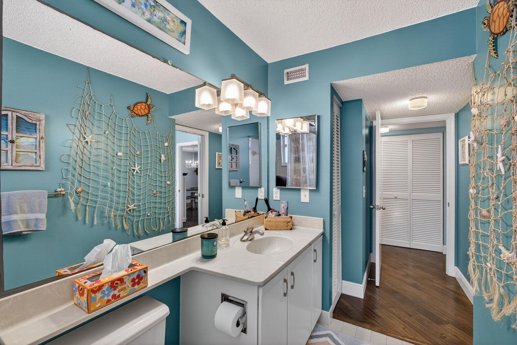 1206 Mainsail Circle Jupiter, FL 33477 - Photo 35 of 46 a bathroom with a sink vanity granite and a mirror
