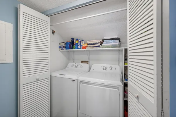 a utility room with dryer and washer