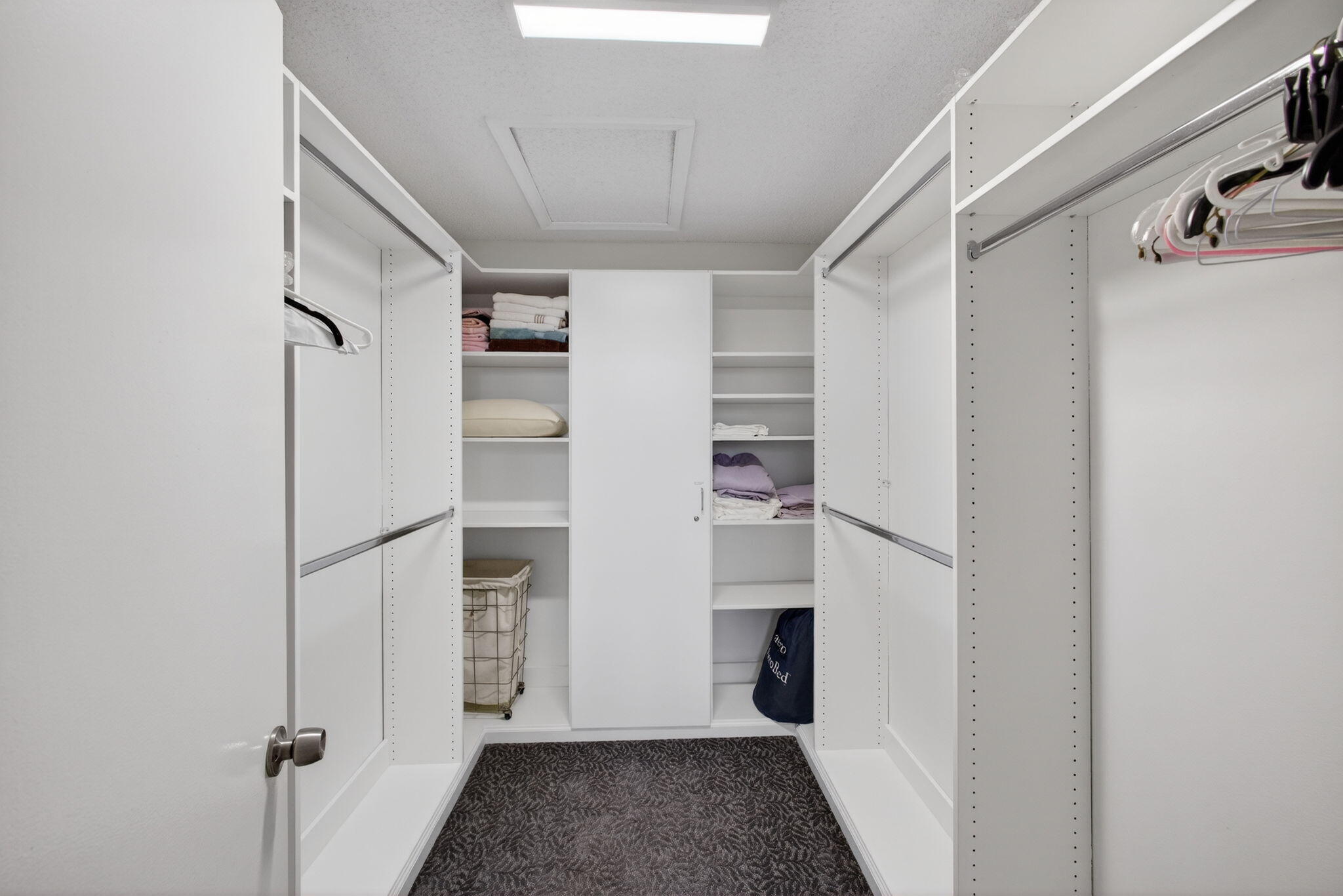 1206 Mainsail Circle Jupiter, FL 33477 - Photo 43 of 46 a view of walk in closet with empty racks