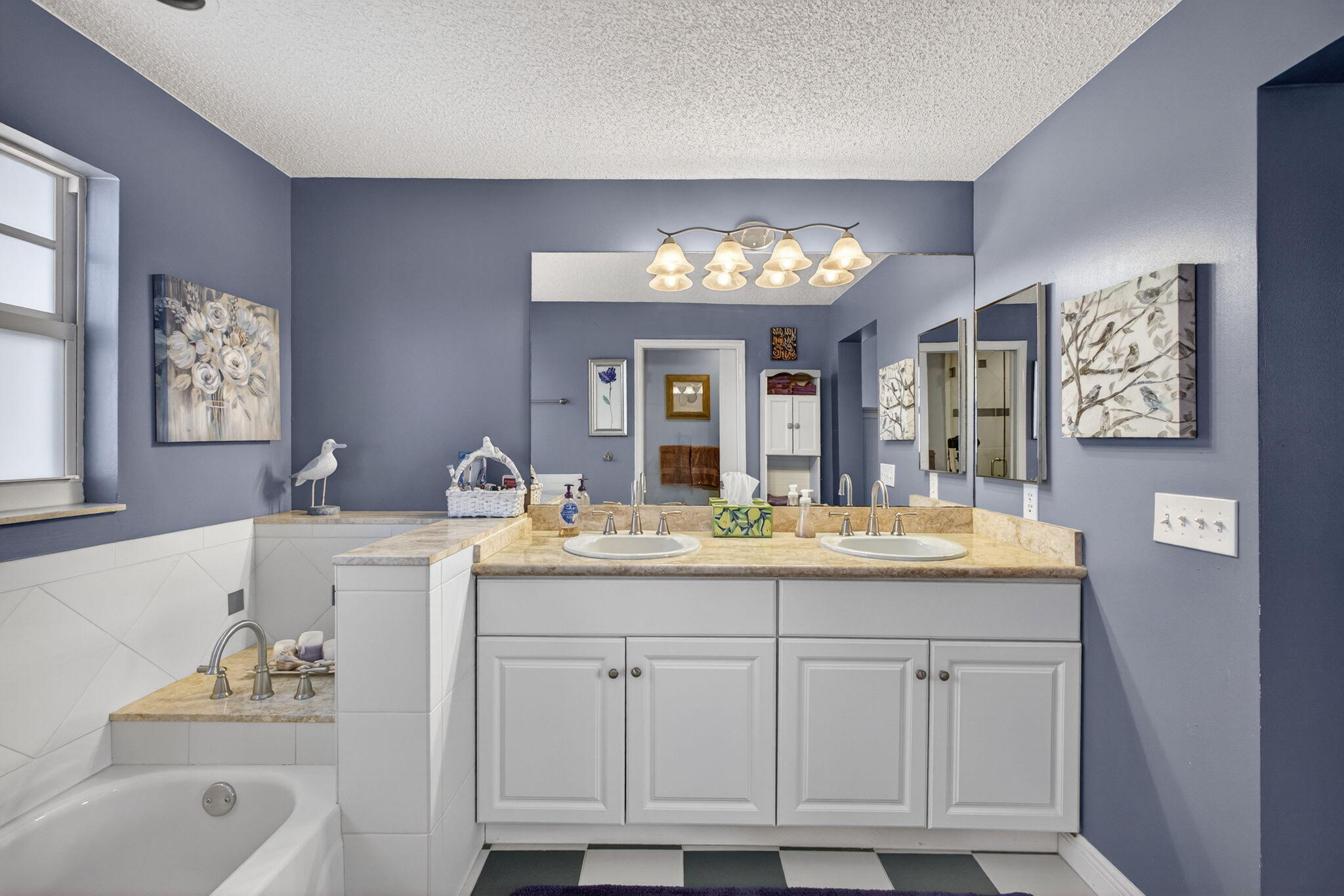 1206 Mainsail Circle Jupiter, FL 33477 - Photo 45 of 46 a bathroom with a granite countertop sink and a mirror
