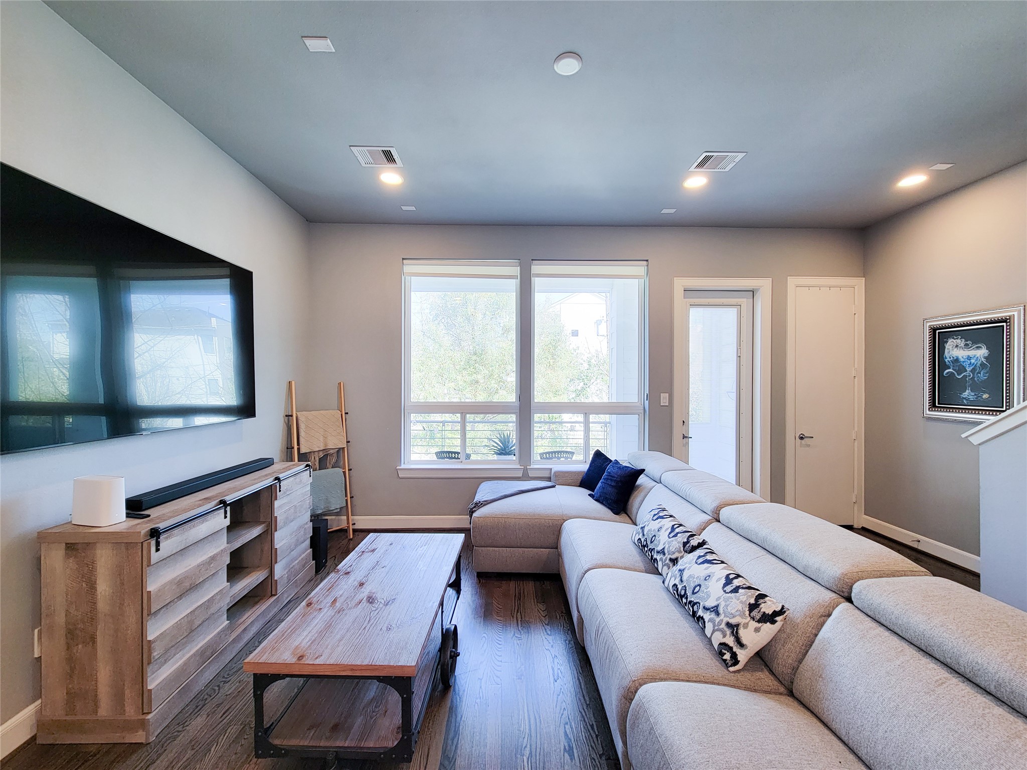 1705 Eado Point Lane Houston, TX 77003 - Photo 14 of 50 The 2nd floor living area boasts natural light that streams through the wide windows and a glass door that leads to your own private balcony.