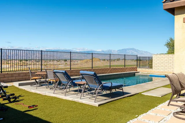 an aerial view of residential houses and outdoor space