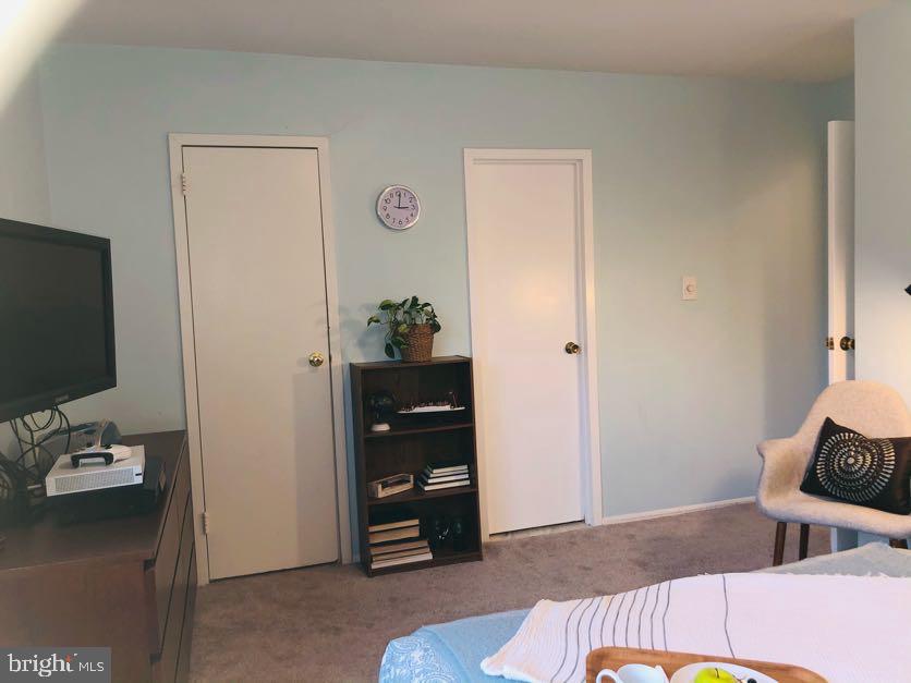 3854 Bel Pre Road, Unit 10202 Silver Spring, MD 20906 - Photo 16 of 24 Walk-in closet and private bathroom