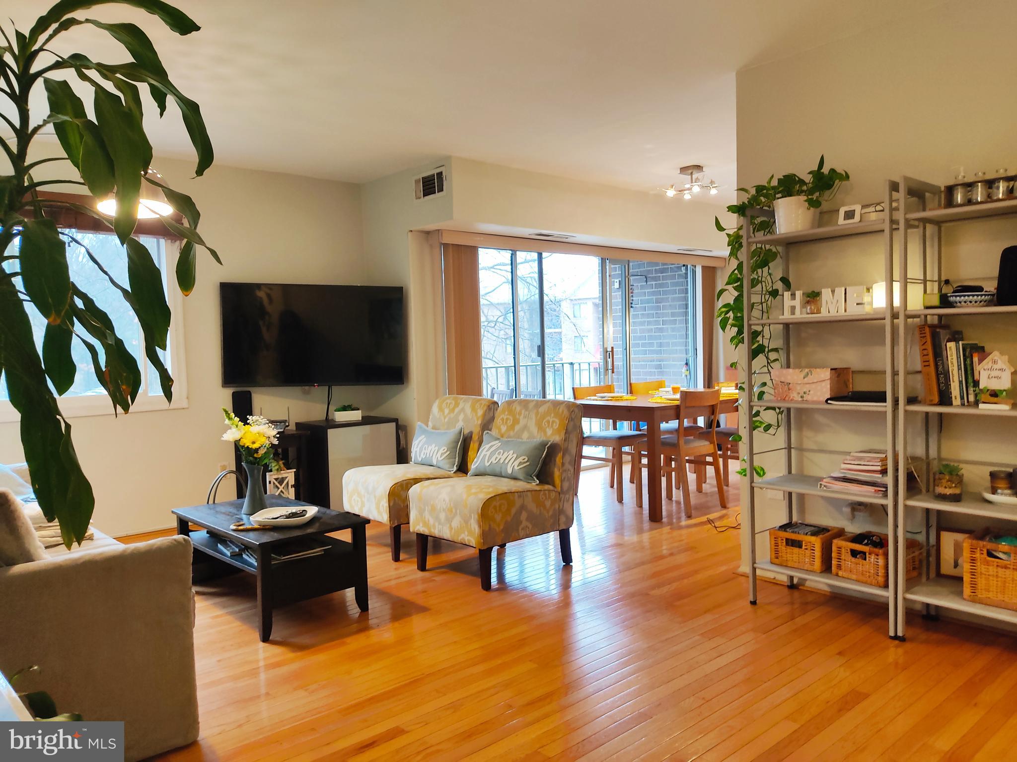 3854 Bel Pre Road, Unit 10202 Silver Spring, MD 20906 - Photo 3 of 24 Living room & dining room