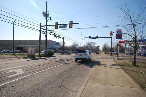 a view of a street with cars