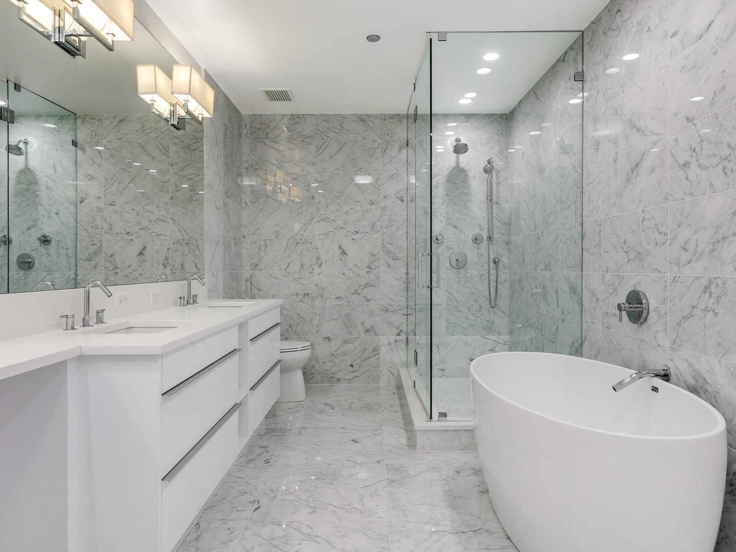 2 West Delaware Place, Unit 130304 Chicago, IL 60610 - Photo 7 of 15 a bathroom with a bathtub and a sink