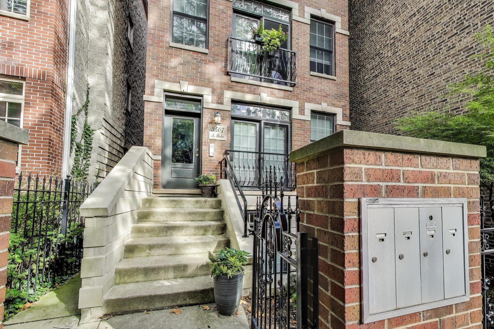 3507 North Reta Avenue, Unit 3 Chicago, IL 60657 - Photo 4 of 24 a view of a building with stairs and windows