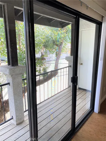 a view of front door and deck