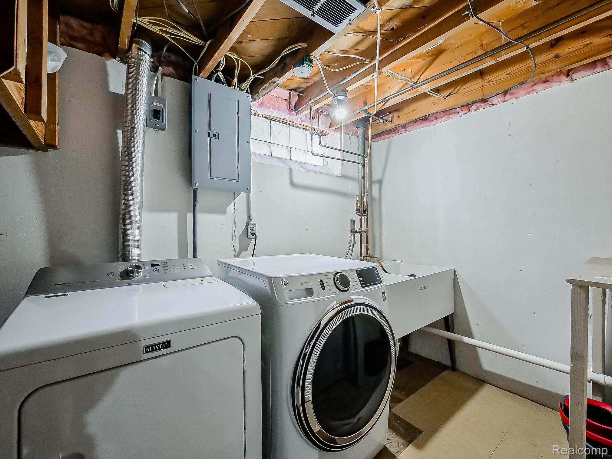 8634 Allen Road Allen Park, MI 48101 - Photo 23 of 38 Laundry area with separate washer and dryer and electric panel