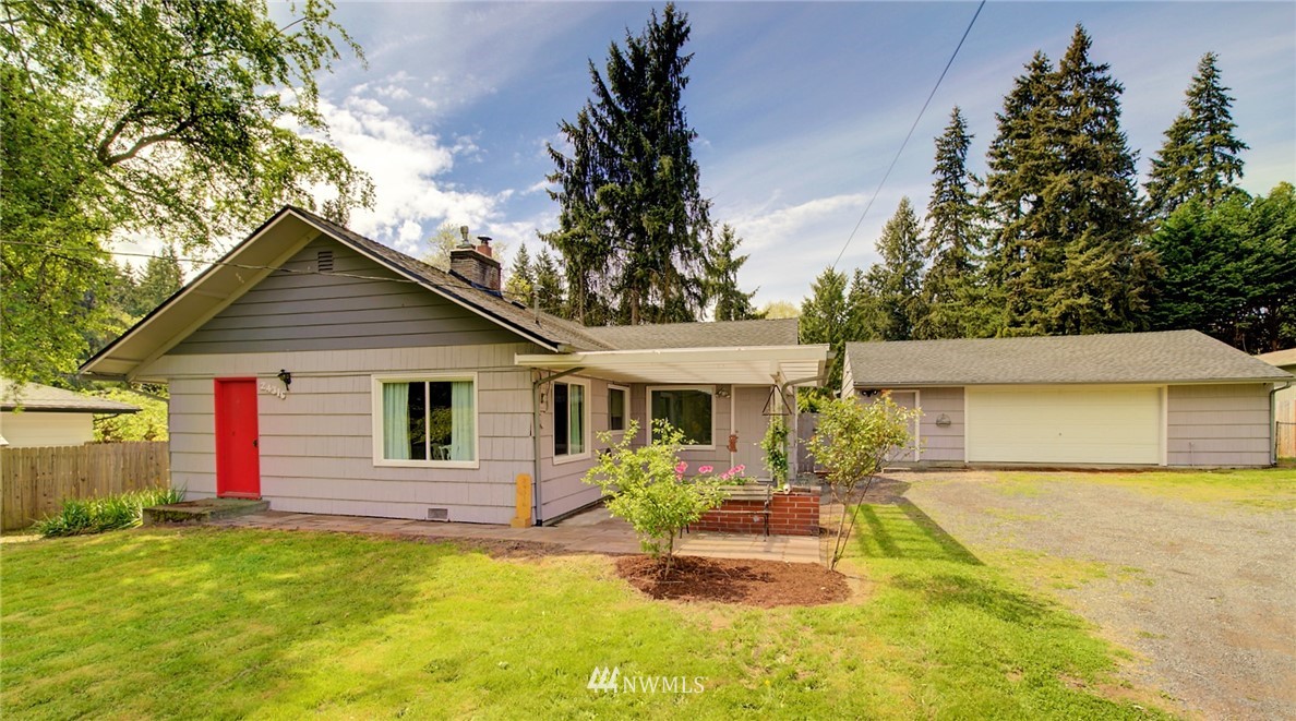 24316 Meridian Avenue South Bothell, WA 98021 - Photo 1 of 29 a view of a house with pool and sitting area