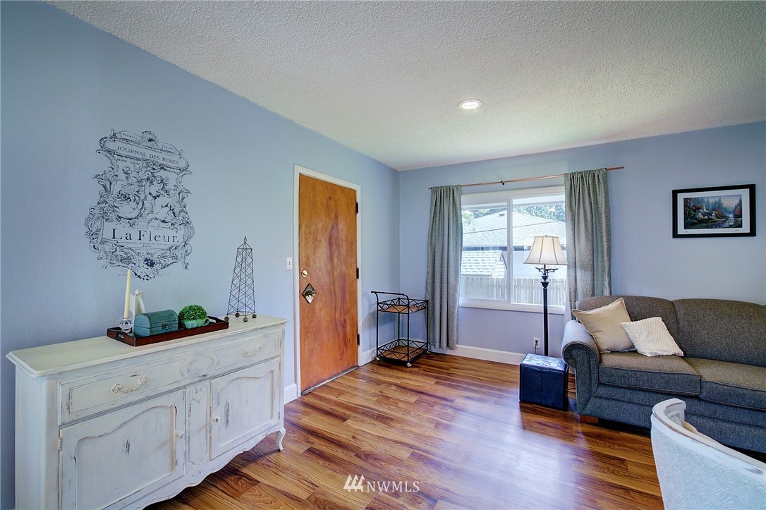 24316 Meridian Avenue South Bothell, WA 98021 - Photo 13 of 29 a bedroom with furniture and window