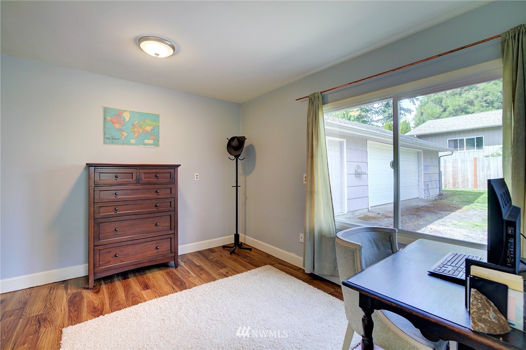 24316 Meridian Avenue South Bothell, WA 98021 - Photo 20 of 29 a view of a workspace with furniture and a window