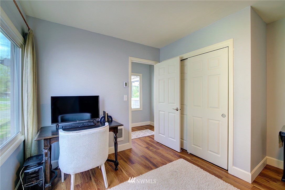 24316 Meridian Avenue South Bothell, WA 98021 - Photo 21 of 29 a view of a livingroom with furniture and a flat screen tv