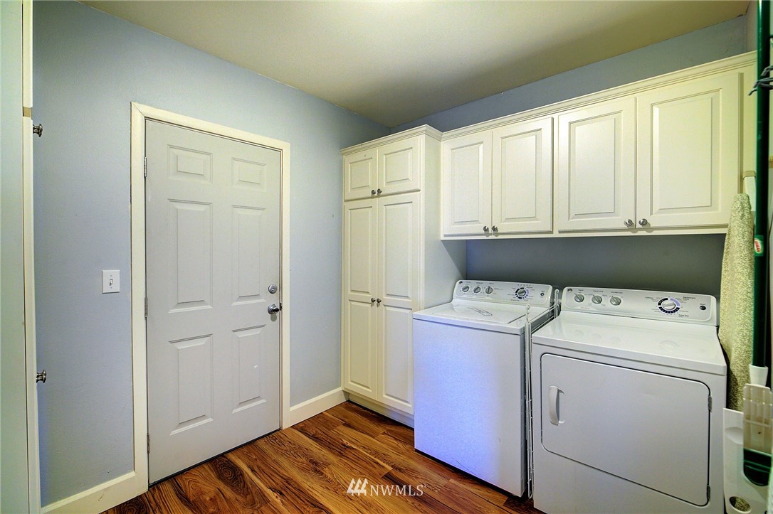 24316 Meridian Avenue South Bothell, WA 98021 - Photo 22 of 29 a utility room with dryer and washer