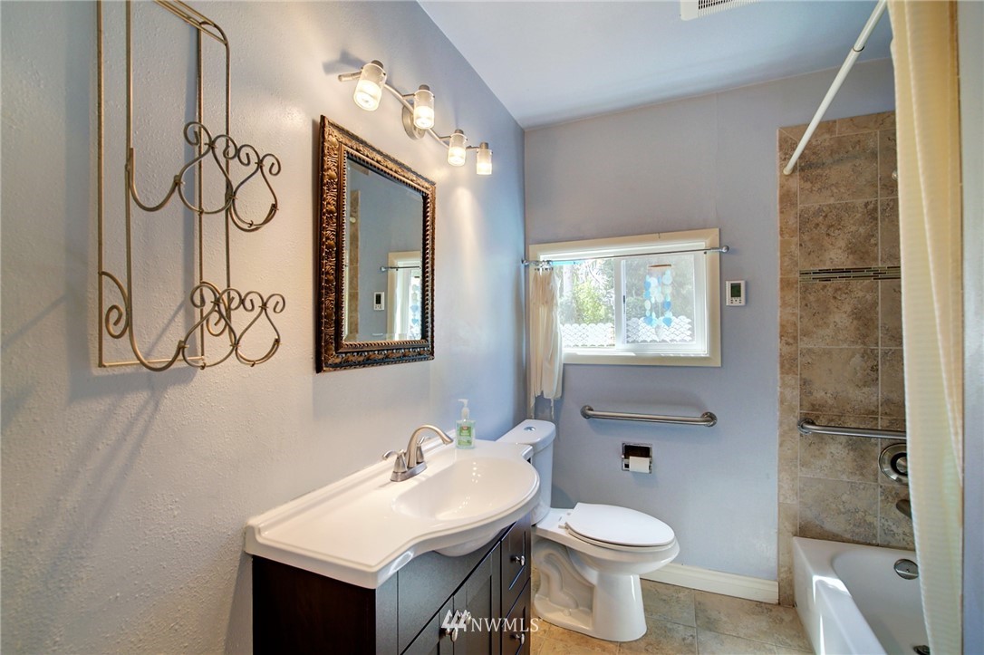 24316 Meridian Avenue South Bothell, WA 98021 - Photo 23 of 29 a bathroom with a sink toilet and shower