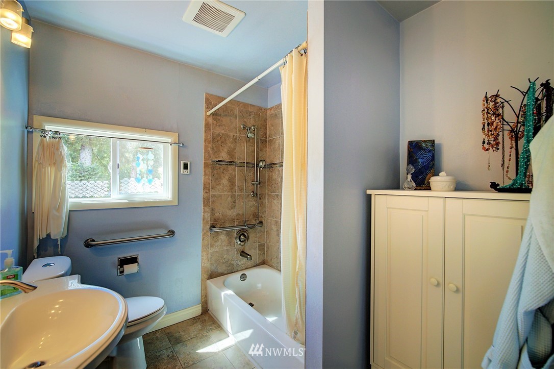 24316 Meridian Avenue South Bothell, WA 98021 - Photo 24 of 29 a bathroom with a sink toilet and shower