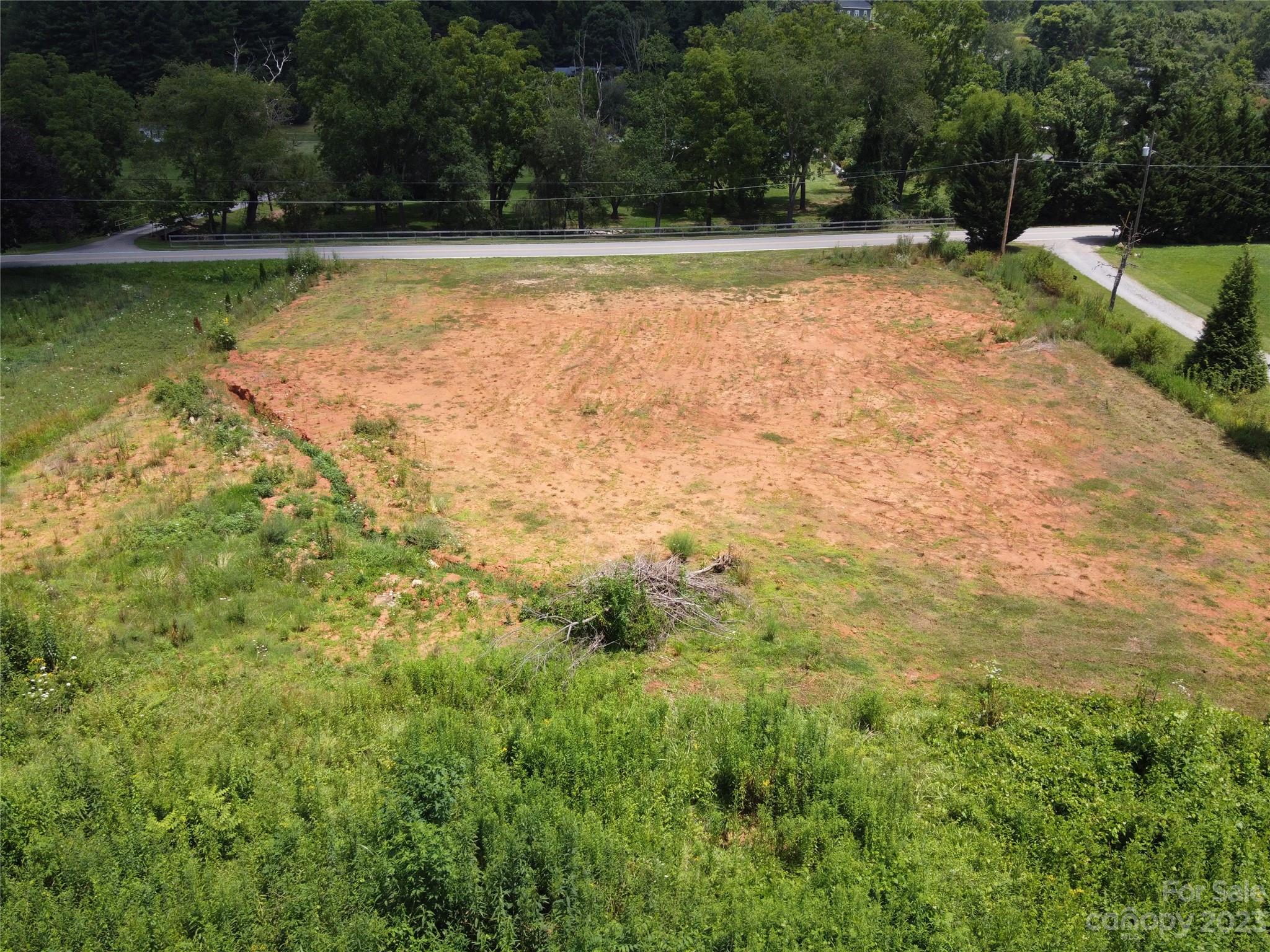 Tbd Beaverdam Road Canton, NC 28716 - Photo 5 of 5 a view of a swimming pool and a yard